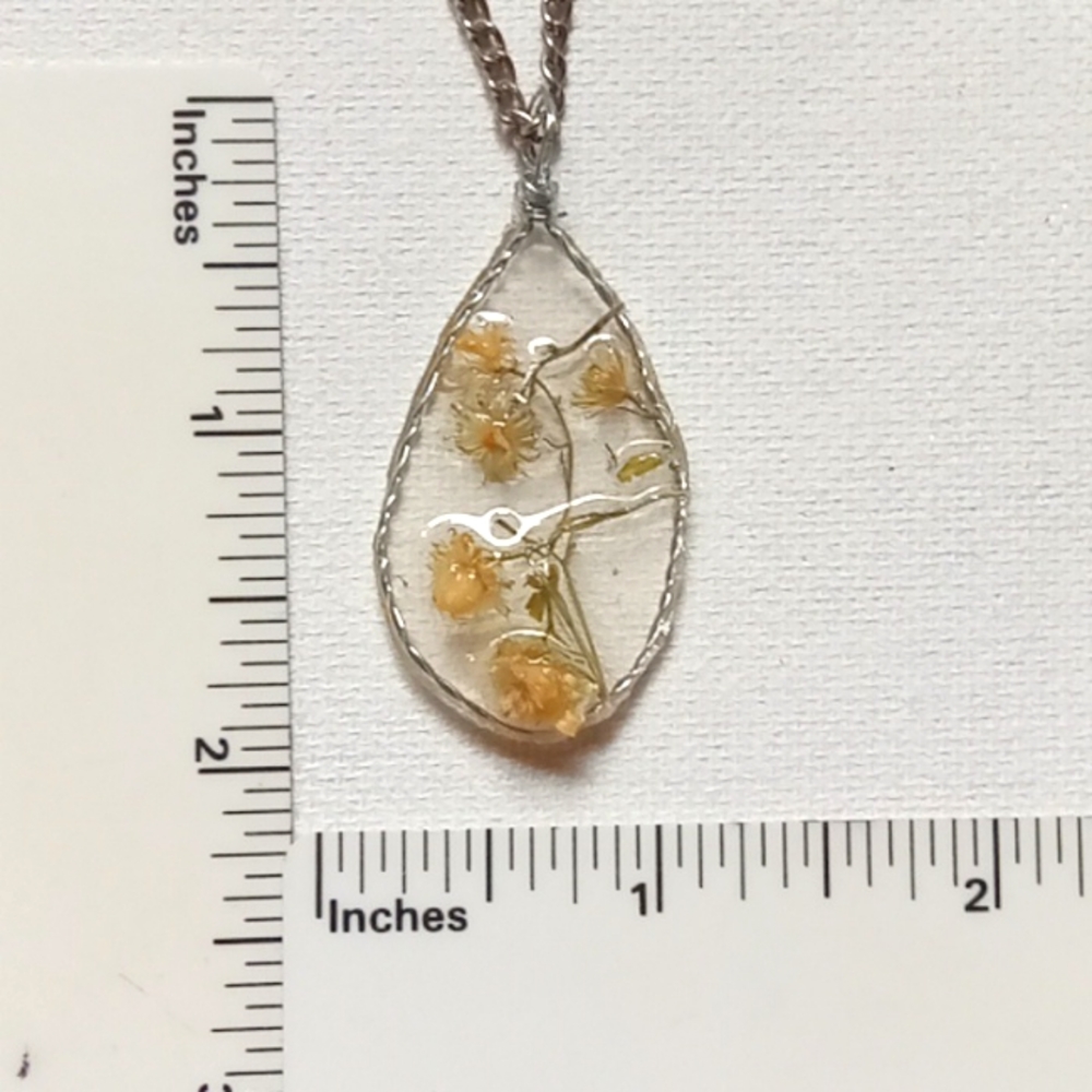 Floral necklace, amulet